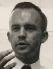 Jim Beutel mugshot (lecturing), black and white, l