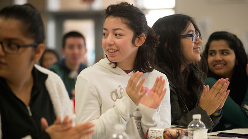 A girl clapping